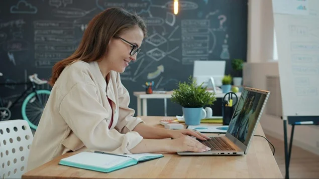 person attending webinar