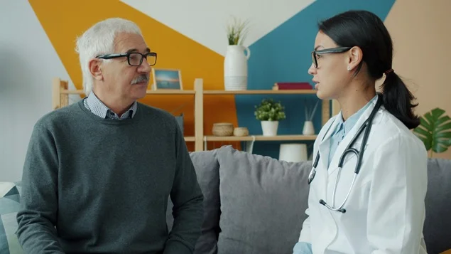 doctor with old age patient