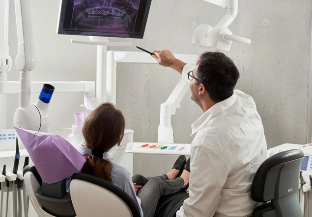 dentist with patient 