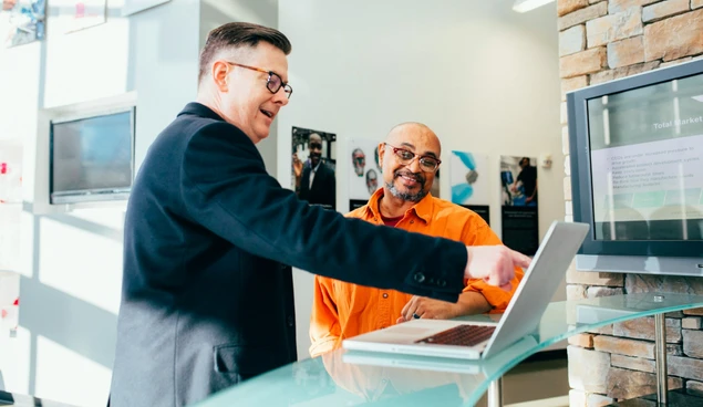 customers showing something on screen