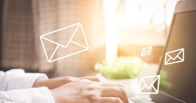 Person typing email icons