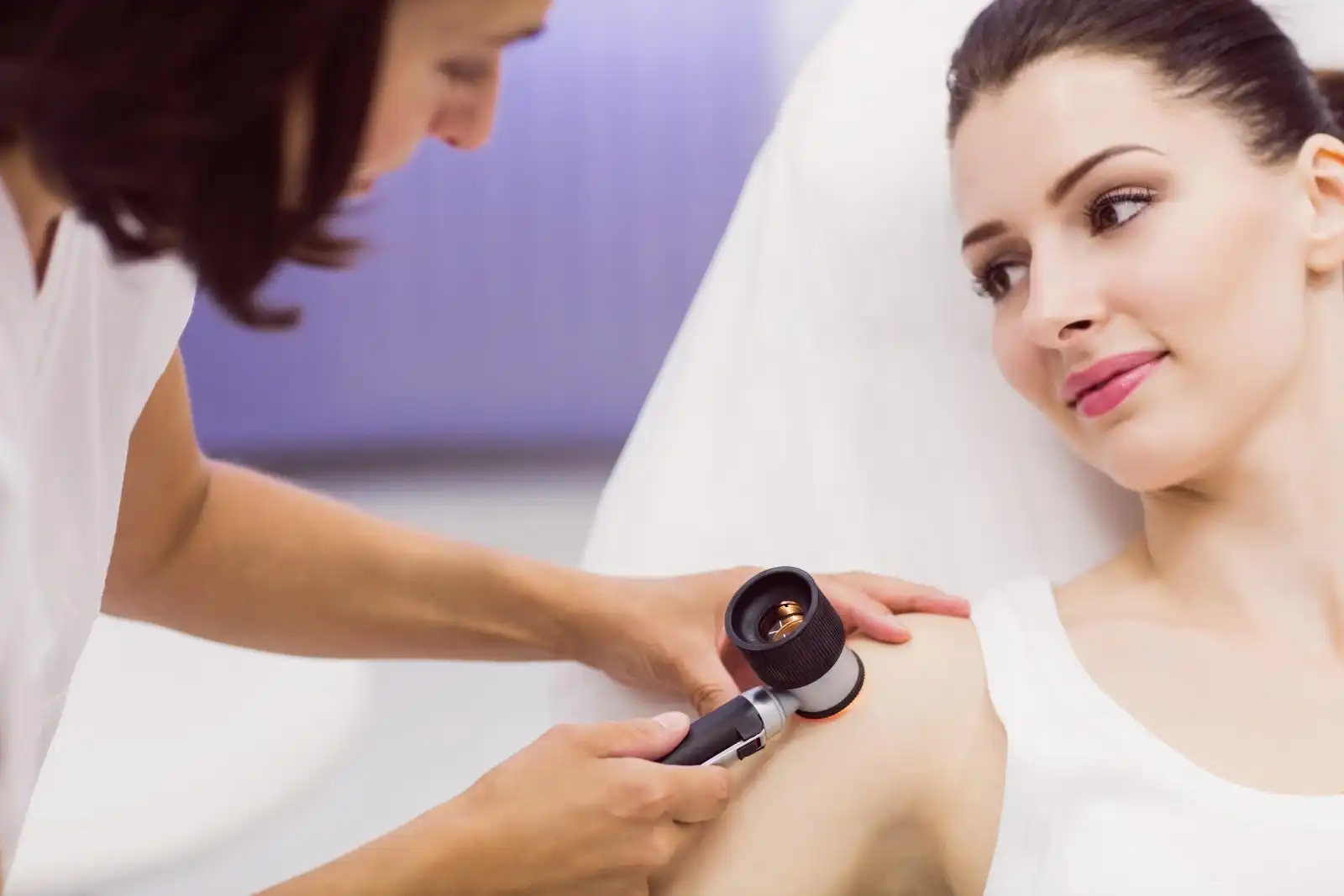 Specialist examining a patient